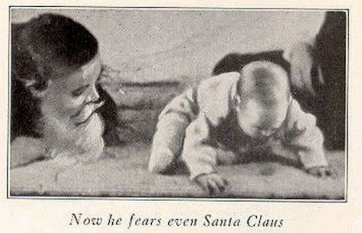 Still from Watson's 1920 film: Watson in a mask, the child recoiling
